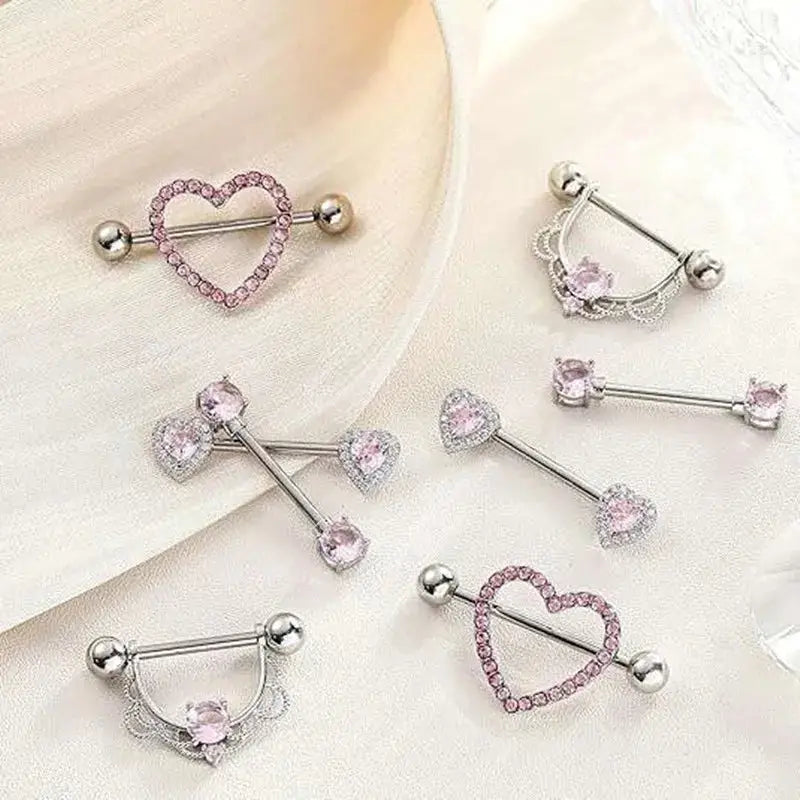 Juego de piercings rosa para pezones - Shakti Energy
